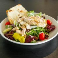Greek Salad · Mixed greens, tomatoes, cucumbers, onions, Kalamata olives, pepperoncini, beets, feta.