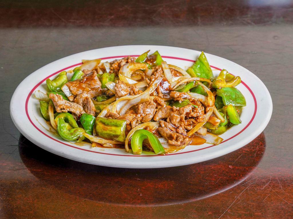 301. Pepper Steak · Stir fried steak with vegetables and a savory sauce.