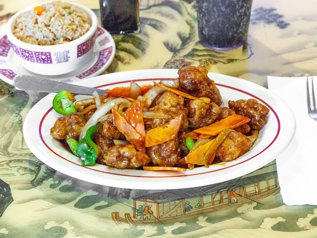 16. General Tso's Chicken · A mouth watering dish made with large chunks of marinated chicken, sauteed with scorched red chili peppers in our special, tangy Hunan sauce. Hot and spicy.