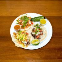 Tacos · Lengua-tongue, pollo-chicken, carne-beef, chorizo-sausage.