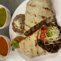 Burritos · Choice of meat. Served with beans, cheese, lettuce, tomato, sour cream, and hot sauce.