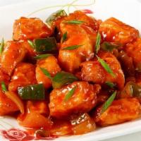 Chili Paneer · Spicy Indo-Chinese dish made with Cottage cheese (paneer) dumplings batter fried in spicy ga...