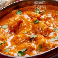 Butter Chicken · Tandoori masala marinated chicken cooked on clay oven and then mixed with rich creamy and to...