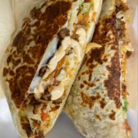 Gordita Crunch · Wrap flour tortilla with lettuce, tomatoe, sweet plantains, fried corn tortilla, cheese, our...