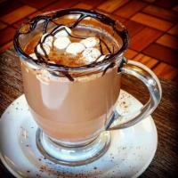 Hot Chocolate · Our chocolate cream based steamed and topped with whipped cream.