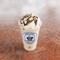 C&B  Snickers Surprise · Vanilla ice cream with espresso, hazelnut syrup, caramel syrup and snickers candy mixed in, ...