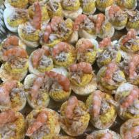 Seafood Eggs · Our homemade deviled egg topped with crab meat, shrimp and old bay 6 pack.