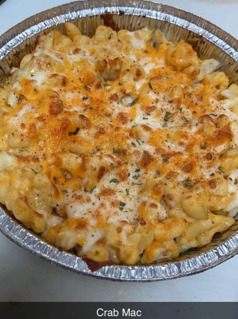 Crab Mac and Cheese Pasta · Mac Maryland style, fresh crab meat atop a bed of mac n cheese sprinkled with old bay.