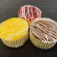 Mini Cheesecake · 3.5-inch rich and creamy cheesecake topped with a sweet topping.