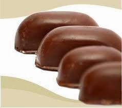 Chocotejas · Chocolate shell filled with dulce de leche and your choice of prune or pecan