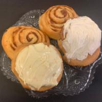 Cinnamon Roll · fluffy cinnamon bread filled with cinnamon and sugar and topped with a rich vanilla icing 