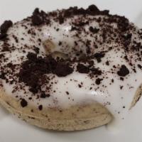 Uh Oh Oreo · Specialty - cookies and cream donut, topped with crumbled cookies, and cream filling icing. 