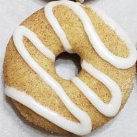 CSI · Regular - cinnamon cake donut, topped with cinnamon, and sugar and vanilla icing.
