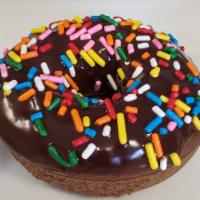 Chocolate w/Sprinkles · Regular - Chocolate cake donut, topped w/chocolate ganache and sprinkles