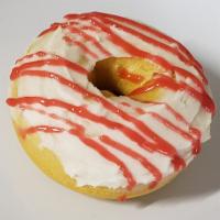 KC Chiefs · Lemon cake donut, topped w/buttercream and raspberry coulis drizzle