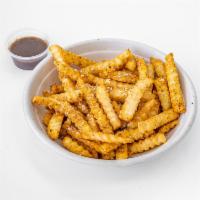Garlic Crinkle Fries · Crinkle fries topped with homemade seasoning. A must try.