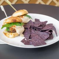 Impossible Meatball Sliders · Marinara, almond ricotta, basil with a side of tortilla chips. Vegan.