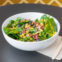 Super Salad · Spinach, kale, walnuts, quinoa, blueberries, goji berries, tossed with honey-turmeric vinaig...