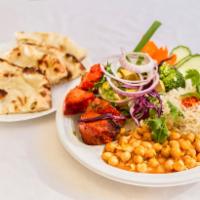 Boneless Chicken Kabob · Boneless and skinless fat-free pieces of chicken breast, marinated with our special herbs an...