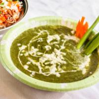 Palak Paneer · Homemade cheese, cooked with spinach in a mild sauce and served with rice.  