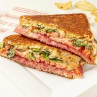 The Italian Grilled Cheese · Salami, mozzarella cheese, tomatoes, lettuce and chipotle/red pepper aioli.