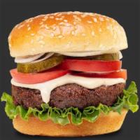 Falafel Burger (Tahini Style)  · 1 /4 lb. patty, tahini, leaf lettuce, pickles, shaved onions, and Roma tomato. Vegetarian.