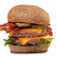 The Keto Burger · 2 Angus Beef Patties, Mixed Greens, Pickles, Bacon, Cheddar Cheese
(The bun is gluten-free, ...