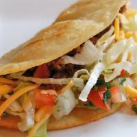 Homemade Taco  · Folded fried flour tortilla with a variety of fillings such as meat, onion and potato. 