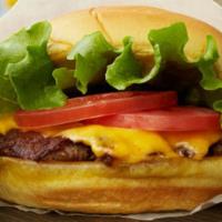 Classic Burger  · Tomato, pickle, onion lettuce, mustard, American cheese. 