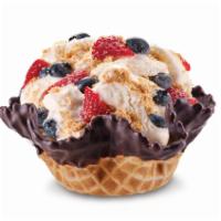 Cheesecake Fantasy · Cheesecake ice cream with graham cracker pie crust, blueberries, & strawberries.