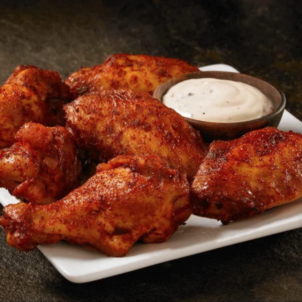 Roasted Wings - 6 Pieces · We’ve done it again. Starting with the tradional bone-in wings, oven roasted until crispy, keeping all that delicious flavor, but only 1/2 the calories! Try ’em tossed with Lemon Pepper - or any rub or sauce, you can’t go wrong.
