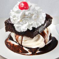 Hot Fudge Cake · Whip cream, nuts and cherry included upon request.