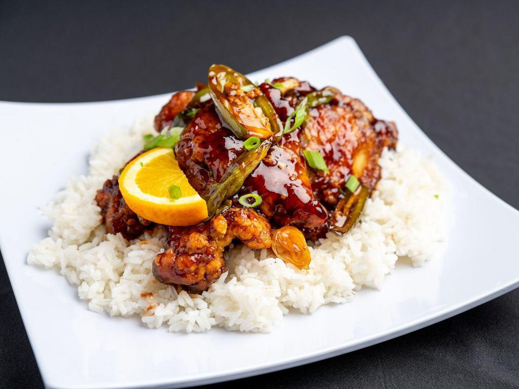 Orange Peel Chicken · Crispy chicken with orange chili sauce. Served with your choice of rice. Hot and spicy. 