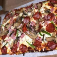 The Dom's Original Pizza · Pepperoni, Italian sausage, Canadian bacon, green pepper, onion and mushrooms.