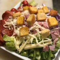 Antipasto Salad · Romaine lettuce, tomatoes, onions, green peppers, honey ham, pepperoni, provolone, mozzarell...
