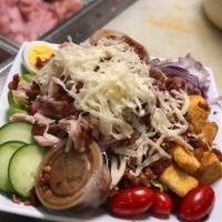 Chef Salad · Romaine lettuce, tomatoes, onions, cucumbers, hard-boiled egg, honey ham, roasted turkey, ba...