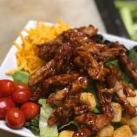 Crispy BBQ Chicken Salad · Romaine lettuce, tomatoes, onions, cucumbers, black olives, shredded cheddar cheese, crouton...
