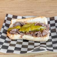 Italian Beef Sandwich · Choice USDA inside round.  With recipes passed down from our dear friends in Bari Italy. Sea...
