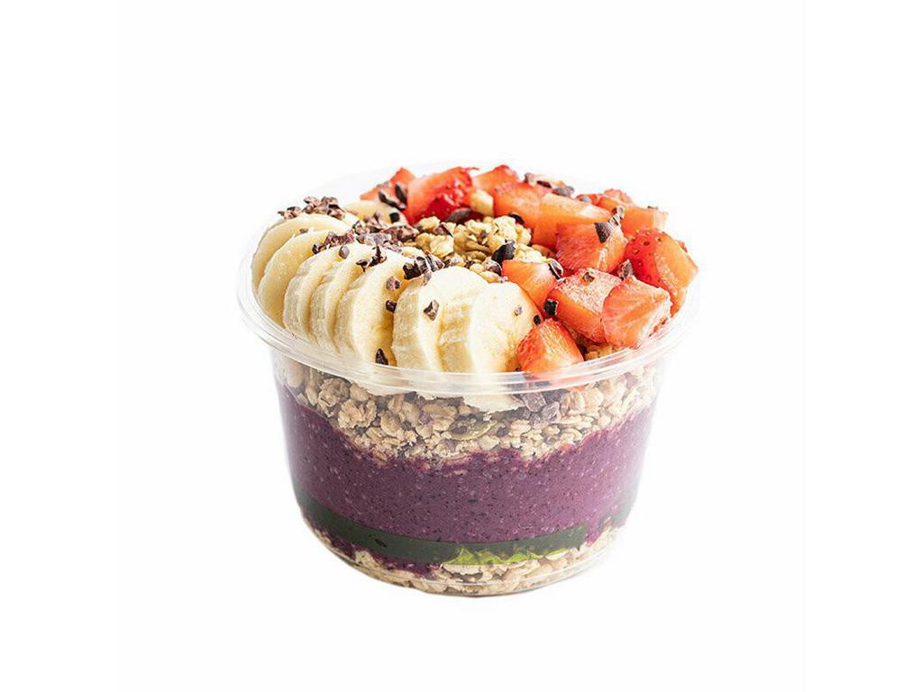 PB and J Bowl · Banana, strawberry, blueberry, and peanut butter blended together and topped with pumpkin seed and flax granola, banana, strawberry, cacao nib, and honey.