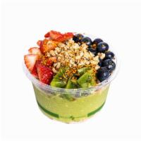 Superfood Bowl · Spinach, kale, avocado, banana, and mango blended together and topped with pumpkin seed and ...