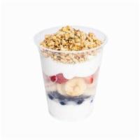 Yogurt Parfait · Greek yogurt, pumpkin seed & flax granola, blueberry, strawberry, banana and topped with honey