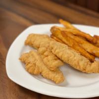 Chicken Strips · Breaded chicken tenders, french fries, and ranch dressing.