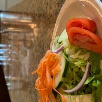 House Salad · Mixed greens, tomato, red onion ,cucumbers and carrots.
