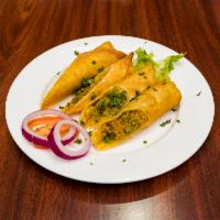 Chicken Kathi Roll · An array of lightly seasoned chicken and vegetables, gently wrapped in dough, and deep fried...