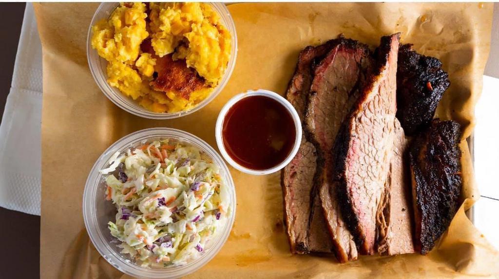 Brisket Family Pack · 1 lb of sliced brisket, two pint sides of your choice. Feeds 2 adults, 2 kids…or 3 adults.