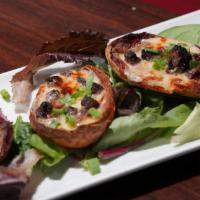 Pub Skins · Crispy potato skins, house made beer cheese, topped with smoked pork belly and green onion, ...