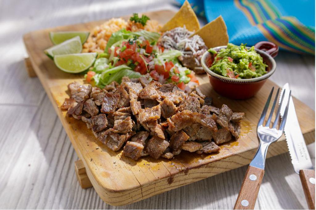 Regular Plate · Choice of meat served with rice, beans, guacamole, pico de gallo, and lettuce.