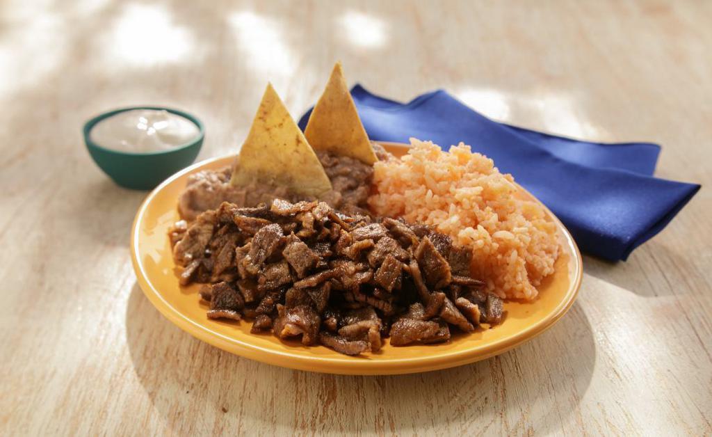 Kids Plate · Choice of meat served with rice and beans.