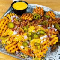 Fully Loaded Waffle Fries · Tossed with Cajun dry rub, bacon bits, red onion, jalapenos, shredded cheese and beer cheese...