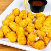 Wisconsin Cheese Curds · Ellsworth, WI, breaded white cheese curds and marinara dipping sauce.